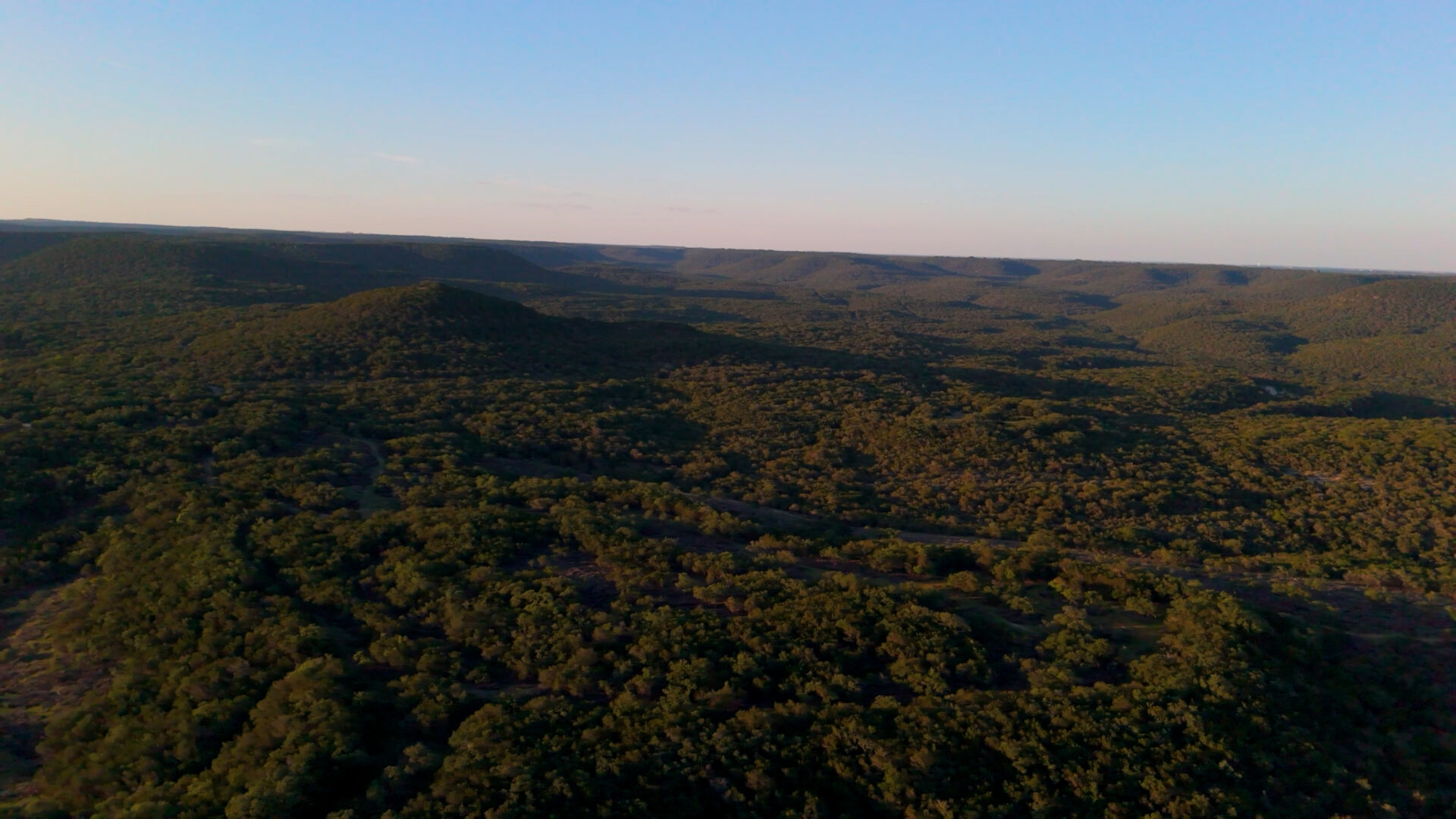 Balcones Canyonlands landscape in the Texas Hill Country showing rugged terrain and native vegetation patterns.