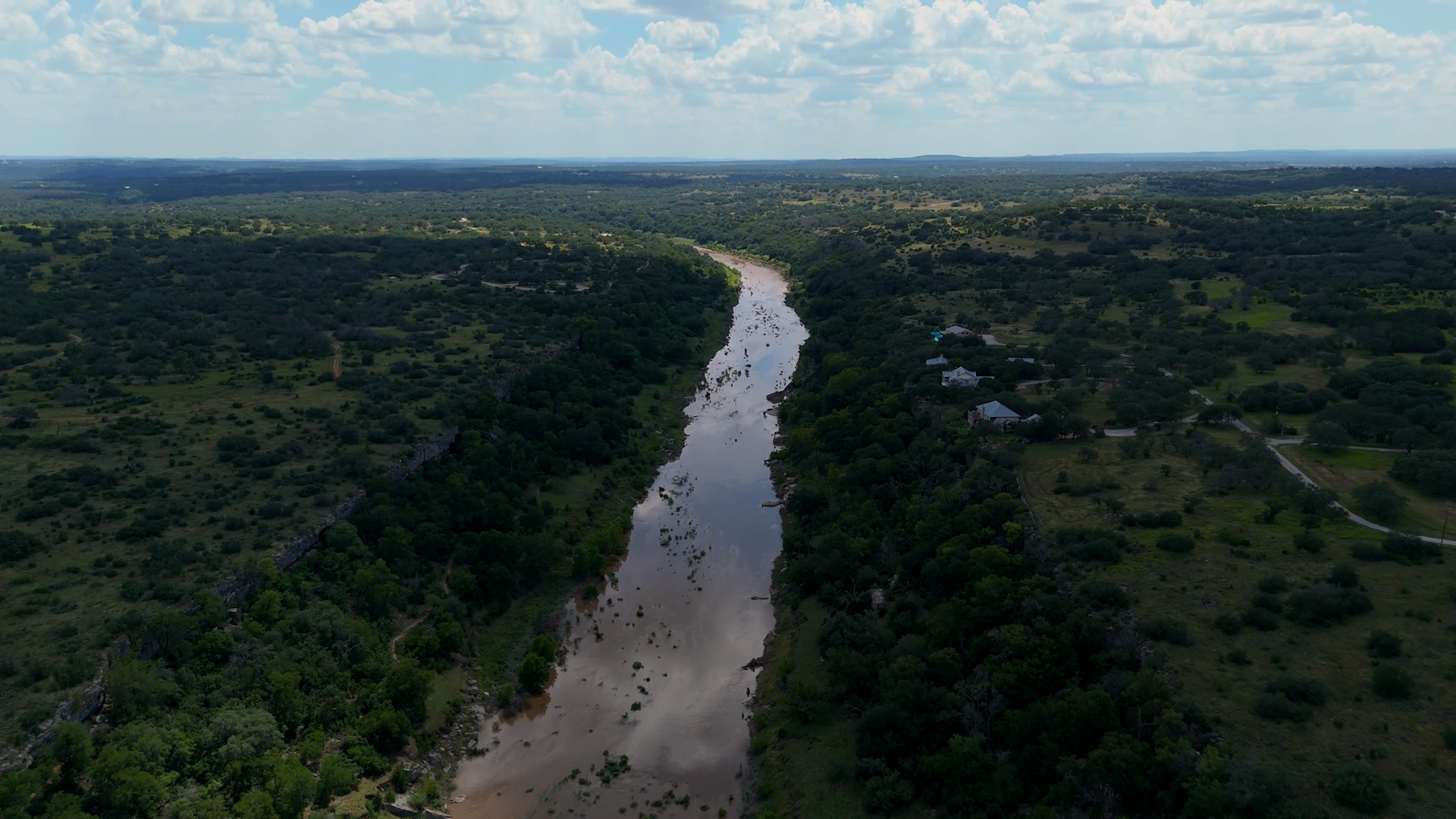 Aerial view of the Pedernales River flowing through the Texas Hill Country